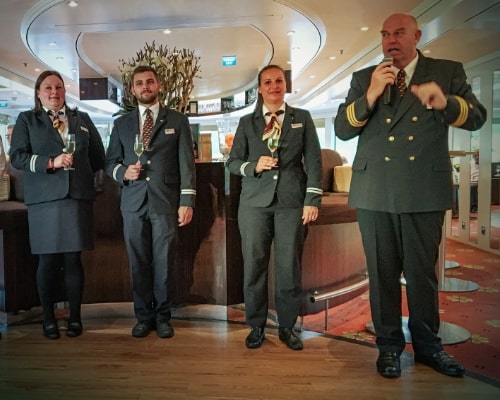 The captain together with his crew welcomes the guests on board